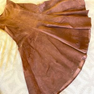 Long split leather skirt. High waisted with back zipper.
